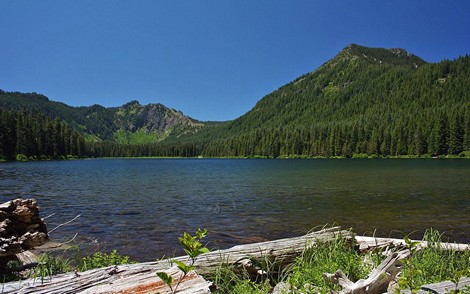 Battle Ax Mountain rises above Elk Lake